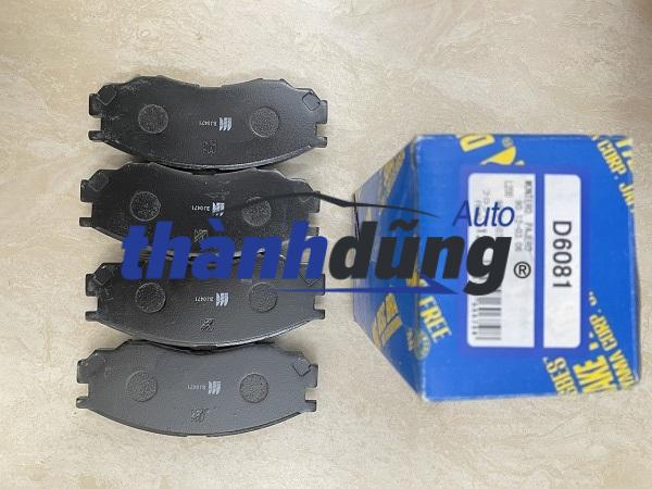 BỐ THẮNG TRƯỚC MITSUBISHI PAJERO 2012